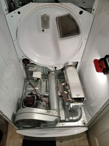 Dryer idler pulley accessed for drive system repair