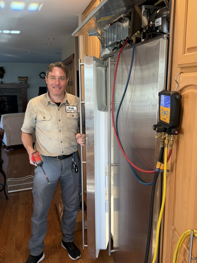 FixPro technician providing appliance diagnostics in Rochester, WA